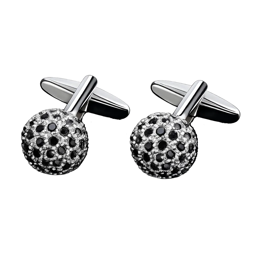 Pair of silver cufflinks with black and white gemstones on a white background
